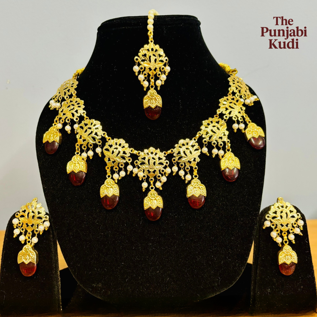 Punjabi Traditional Dakh Set with Tikka in Red Stones