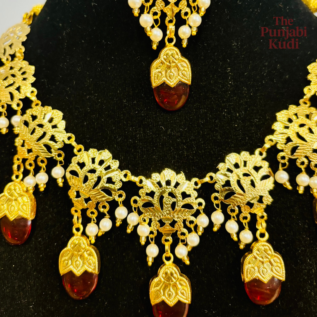 Punjabi Traditional Dakh Set with Tikka in Red Stones