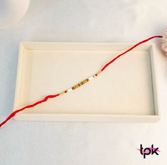 Rakhi with Crystals and Pearls