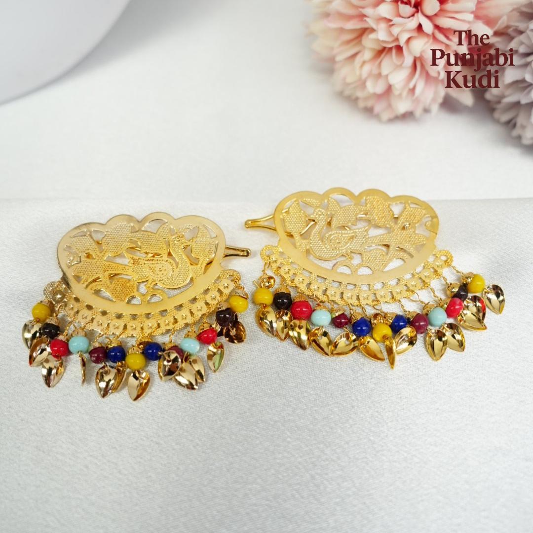 Gold Finished Morni Pippal Patti Patra Hair Clips with Pearls in Multi color
