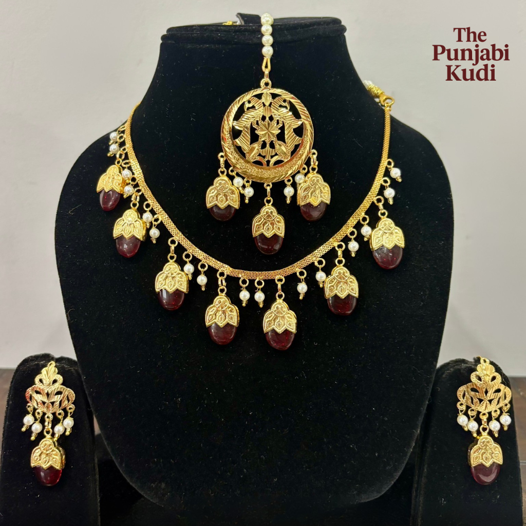 Punjabi Traditional Dakh Set with Tikka in Red Stones