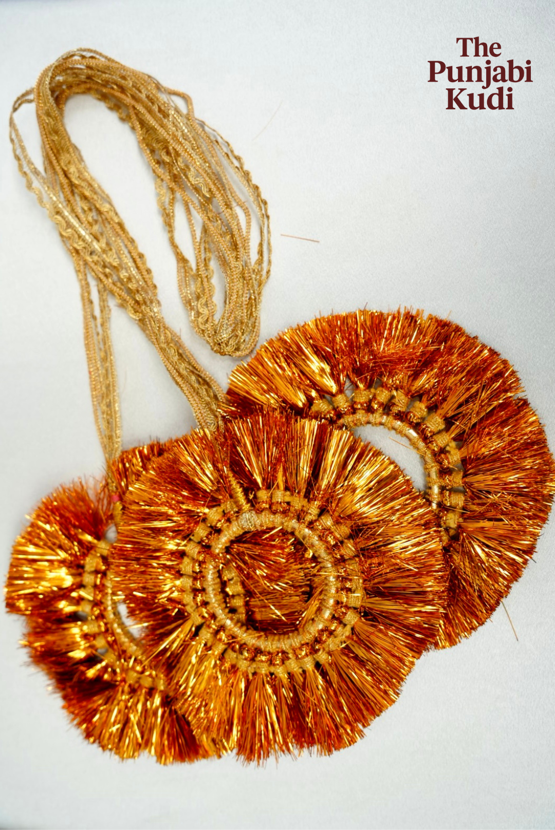 Golden Circle Tassel Paranda