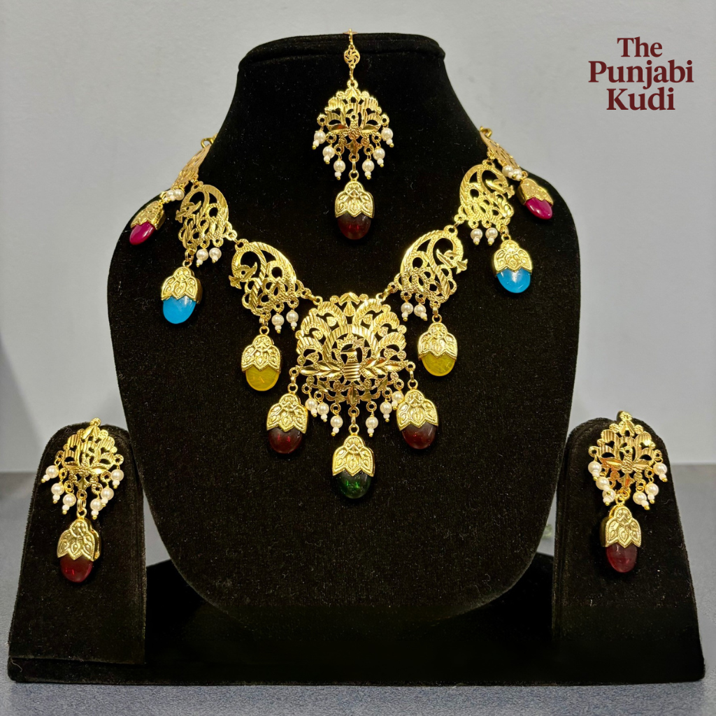 Punjabi Traditional Dakh Set with Tikka in Multicolor Stones