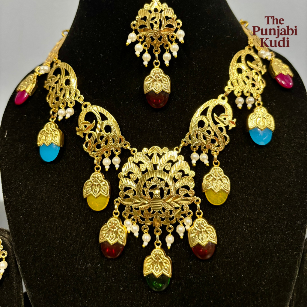 Punjabi Traditional Dakh Set with Tikka in Multicolor Stones