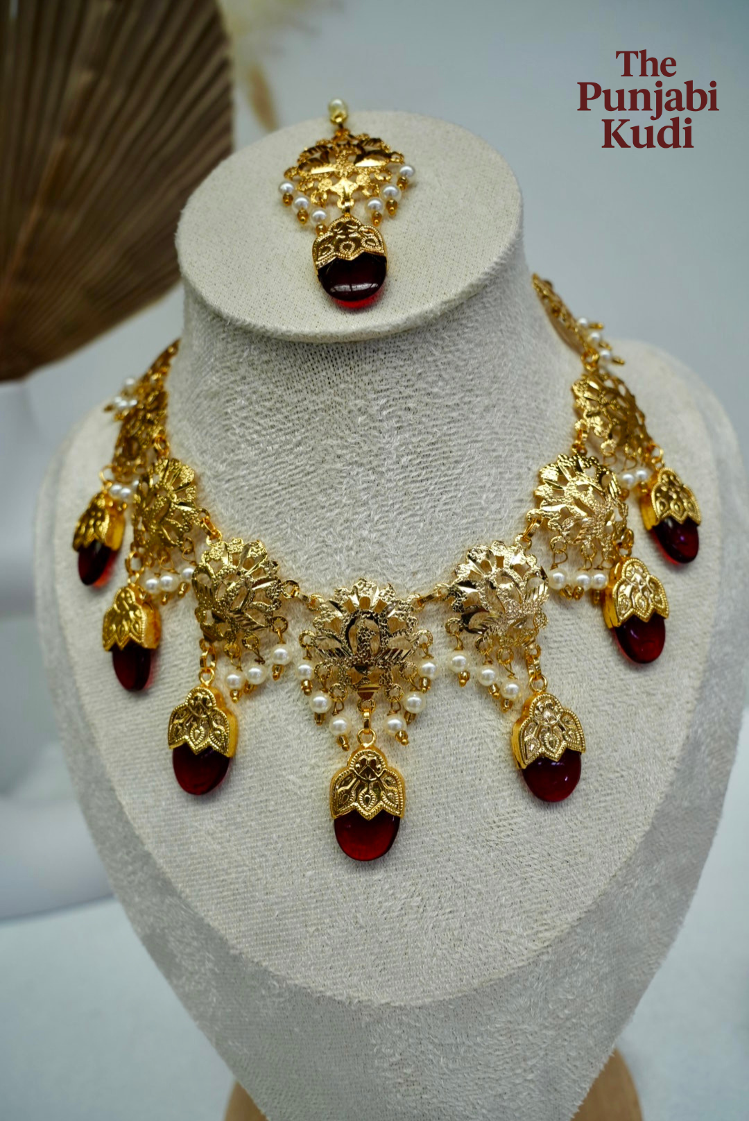 Punjabi Traditional Dakh Set with Tikka in Red Stones