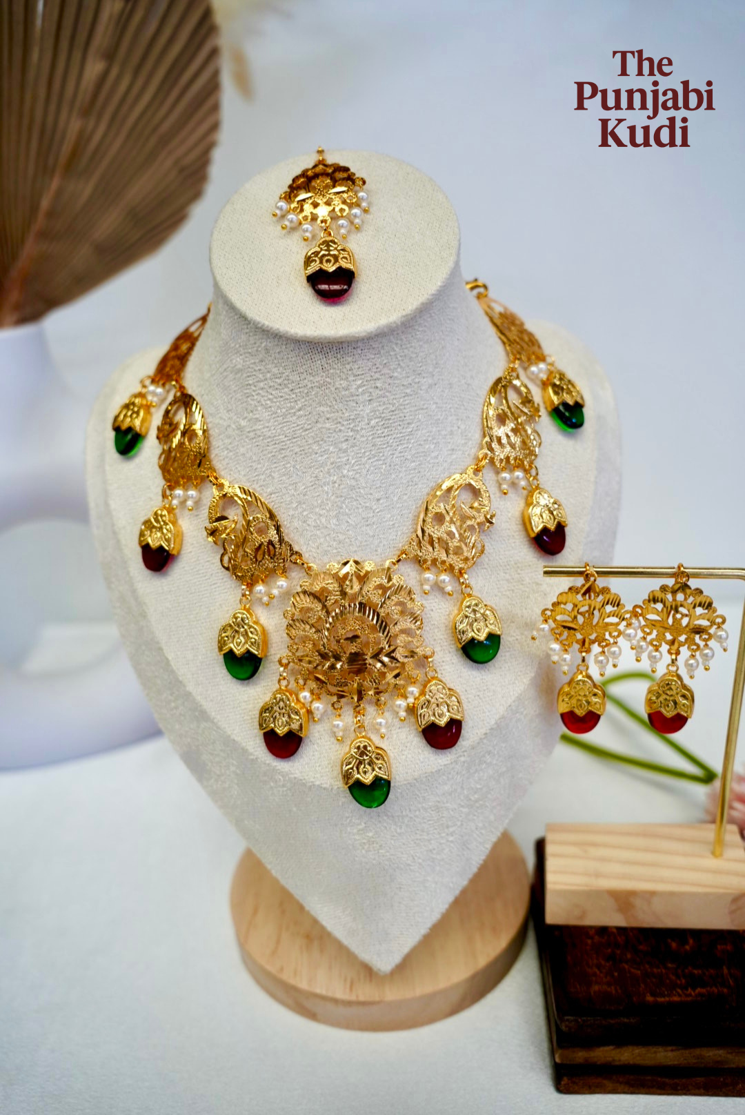 Punjabi Traditional Dakh Set with Tikka in Red and Green Stones