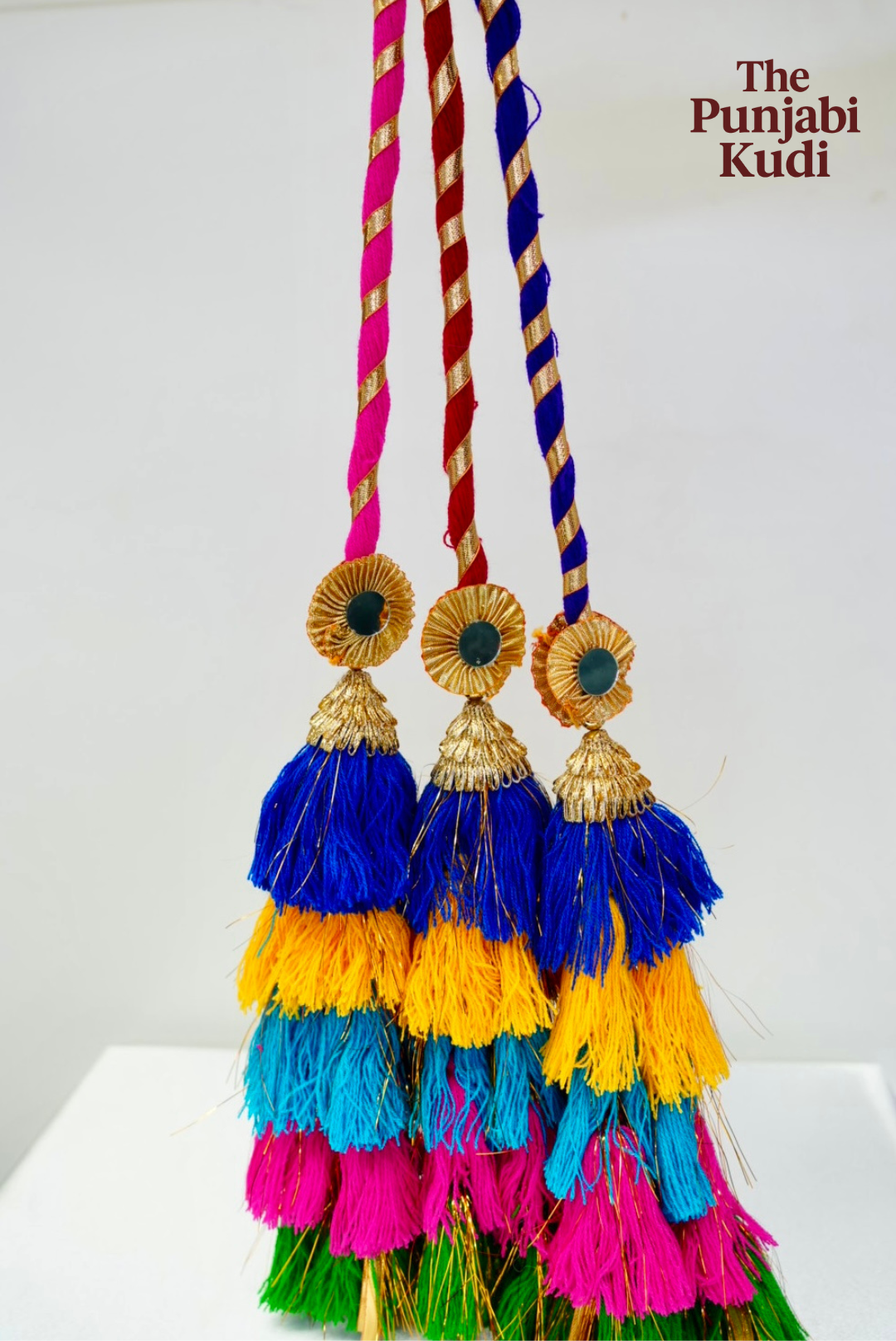 Multicolor Layered Tassel Paranda with Golden Detailing